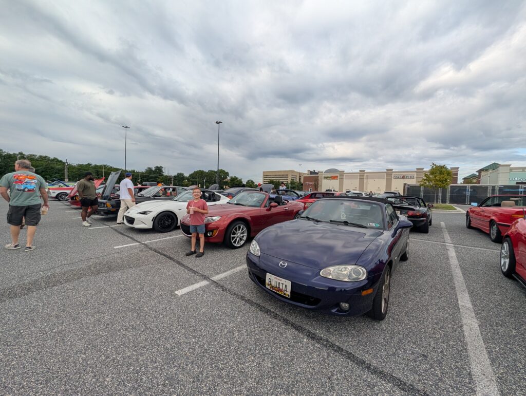 Jack shoiwng the Miata at Cars and Coffee